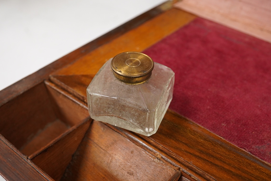 A Victorian walnut rising slope together with a rosewood writing slope